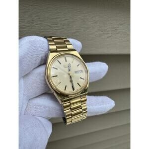 RARE Vintage 1980s Seiko Day Date 8123-7239 Gold Tone Watch Quartz Stainless